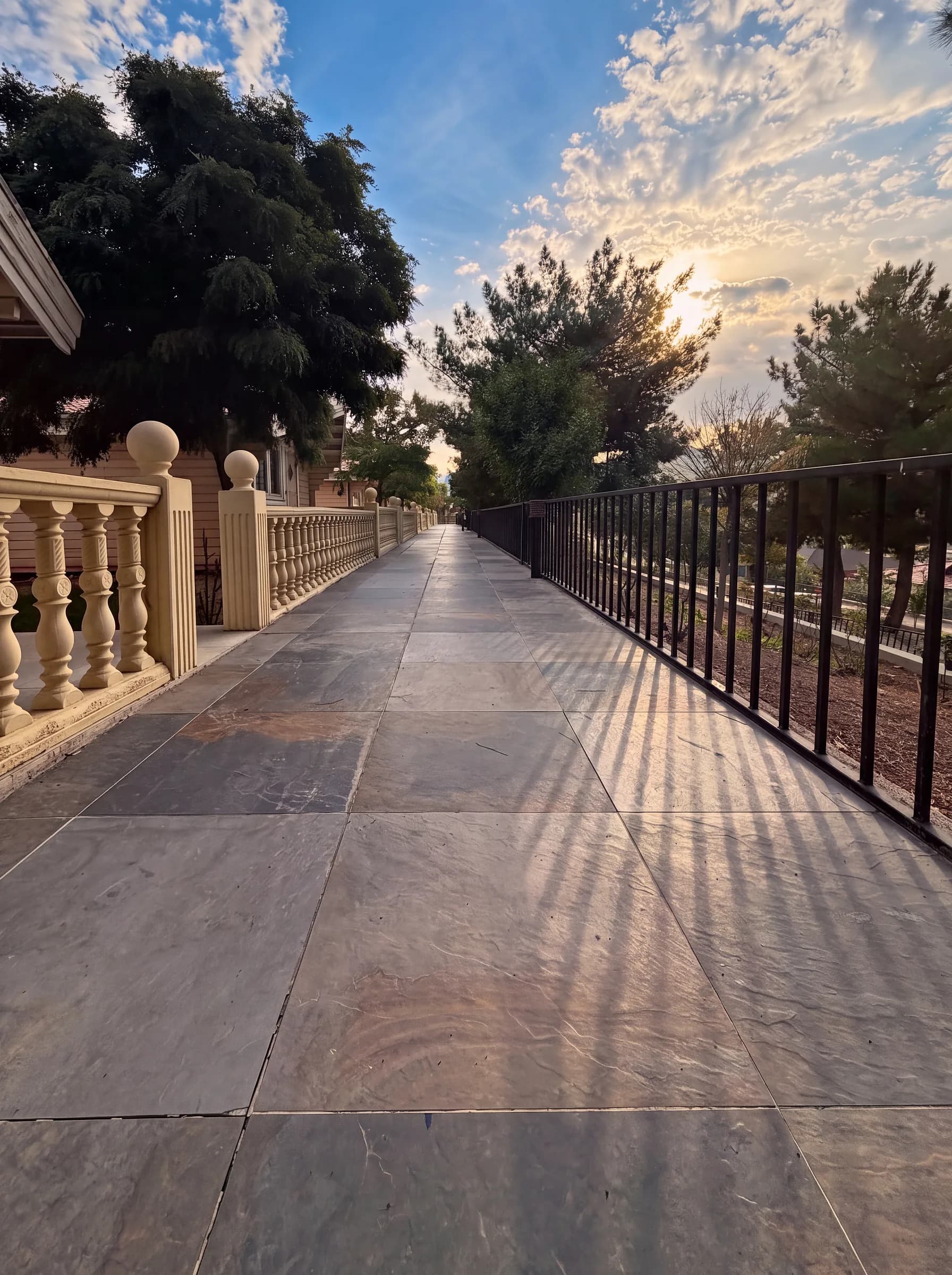 Evening light along the real village gardens and cabin terraces